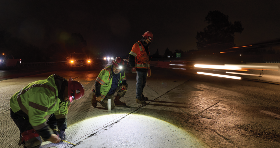 Workers labor on Highway 50 at night. (Photo courtesy of Caltrans)