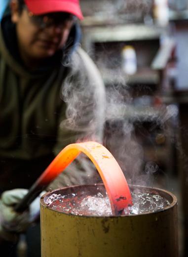 Afterward, he will quench the piece in water to cool. Afterward, he will quench the piece in water to cool.