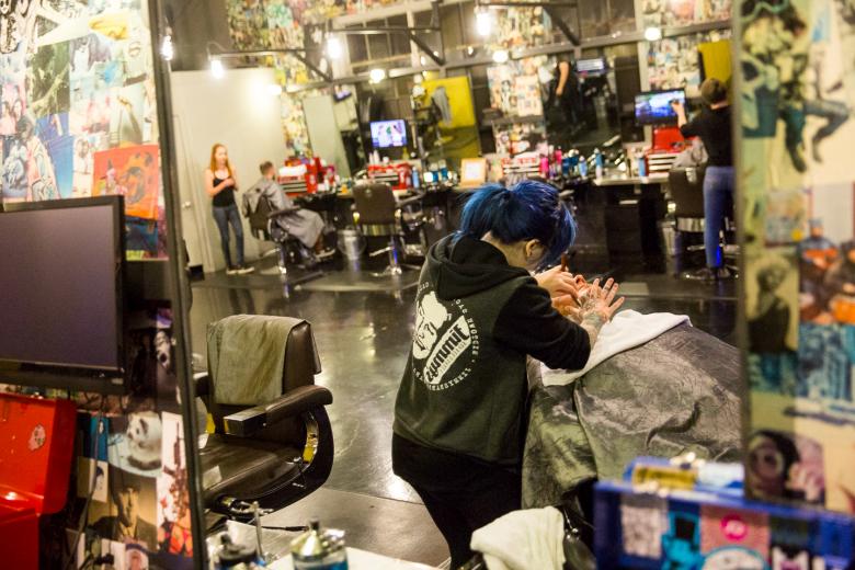 Green employs 18 barbers and stylists, plus receptionists. Her clientele is mostly men, and she offers haircuts, shaves and beard shaping. Green employs 18 barbers and stylists, plus receptionists. Her clientele is mostly men, and she offers haircuts, shaves and beard shaping.