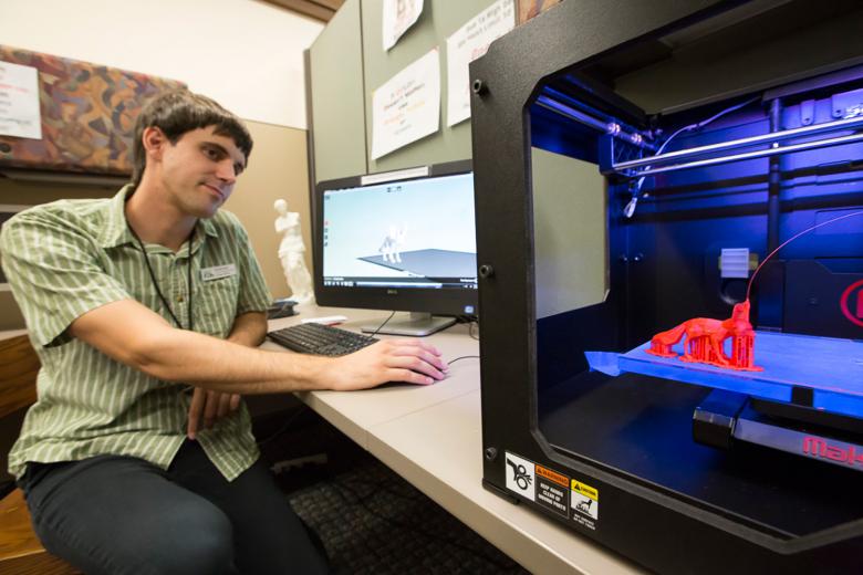 Charles Dale, a tech assistant at the Sacramento Public Library, watches the progress as the MakerBot Replicator 2 builds a fox made from polyactic acid — a biodegradable polyester made from renewable resources. The fox, which at the end was about 7 centimeters long, took 45 minutes to print.
(photo: Ken James) Charles Dale, a tech assistant at the Sacramento Public Library, watches the progress as the MakerBot Replicator 2 builds a fox made from polyactic acid — a biodegradable polyester made from renewable resources. The fox, which at the end was about 7 centimeters long, took 45 minutes to print.
(photo: Ken James)