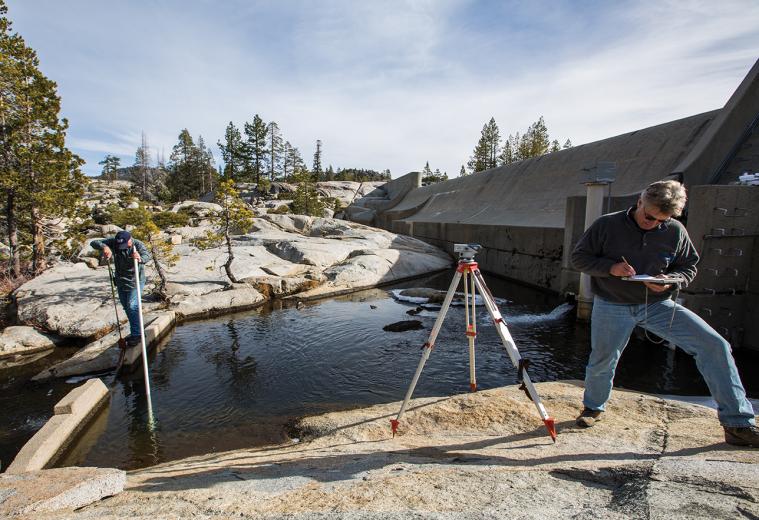 SMUD hydrographer Grant Winslow assesses the flow into a power intake tunnel at Buck Island Reservoir. SMUD hydrographer Grant Winslow assesses the flow into a power intake tunnel at Buck Island Reservoir.