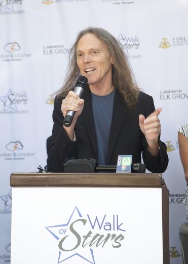 Timothy B. Schmit, a Rock and Roll Hall of Fame member, musician, singer and songwriter, best known as the bass guitar player and singer with the Eagles. Schmit recently released a new solo album, Leap of Faith, in September. He grew up in the Arden Arcade area of Sacramento and attended Encina High School, American River College and Sacramento State. Timothy B. Schmit, a Rock and Roll Hall of Fame member, musician, singer and songwriter, best known as the bass guitar player and singer with the Eagles. Schmit recently released a new solo album, Leap of Faith, in September. He grew up in the Arden Arcade area of Sacramento and attended Encina High School, American River College and Sacramento State.