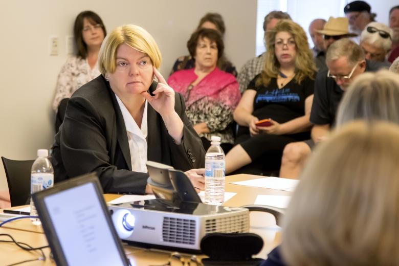 Panel member Lial Jones of the Crocker Art Museum listens to Dr. Paul Jacobs, Executive Chairman of QualComm and part of the Kings ownership team, discuss arena plans by phone. Also participating by conference call were Rene de Guzman, senior curator at the Oakland Museum of California, and AECOM Design Principal Rob Rothblatt. Panel member Lial Jones of the Crocker Art Museum listens to Dr. Paul Jacobs, Executive Chairman of QualComm and part of the Kings ownership team, discuss arena plans by phone. Also participating by conference call were Rene de Guzman, senior curator at the Oakland Museum of California, and AECOM Design Principal Rob Rothblatt.
