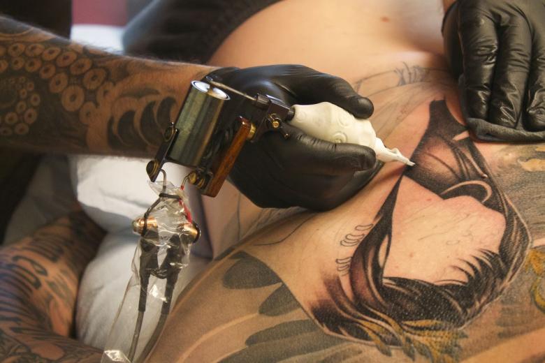 My husband getting some new ink. My husband getting some new ink.