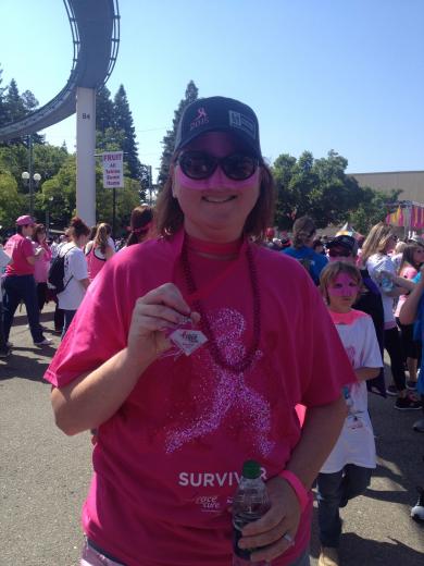Survivor receiving a well-earned medallion. Survivor receiving a well-earned medallion.
