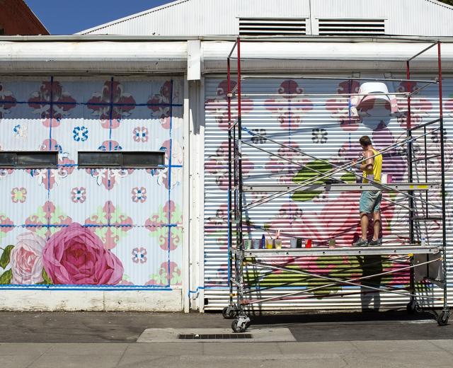 By mid-week, artist David Fiveash has made significant progress on his mural at 1025 R St. in Sacramento.