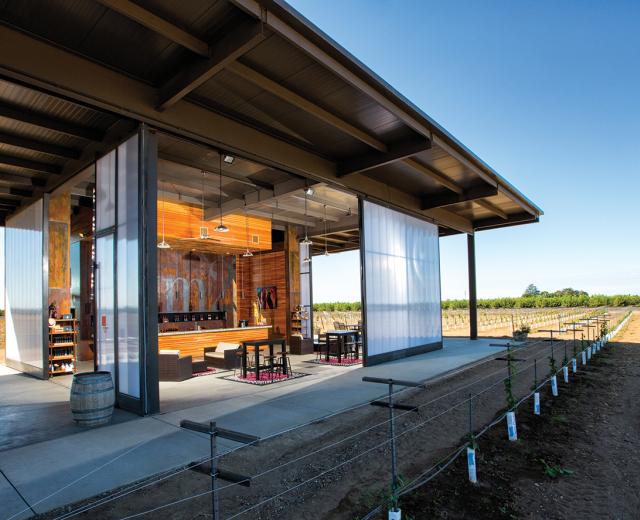 Designed by John Vierra, m2 Vintner’s new indoor/outdoor structure offers patrons the chance to relish the flavors of wine and views of the vineyard simultaneously. 