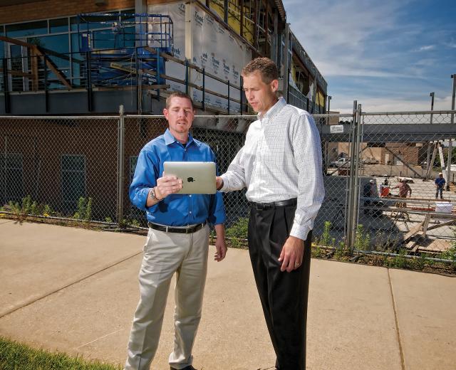 Chrid Ross, CEO of Construction Connect Inc., with company president and COO, Marcus Linden 