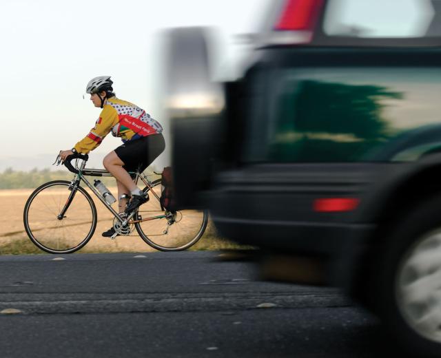 This UC Davis employee rides her bike on County Road 102 nearly every morning from her home in Woodland. 