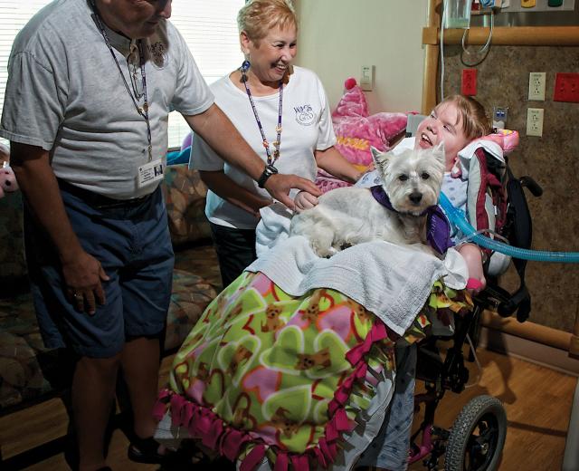 Heather Phillips has been in the hospital for nearly five years. She is visited regularly by Sherm and Sandy Waldman and their West Highland white terrier as a part of a palliative care program at Sutter Roseville Medical Center.  