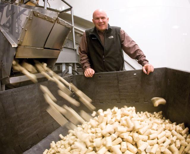 James Herwatt, CEO of Cork Supply USA, which typically sips about 15 million corks a month