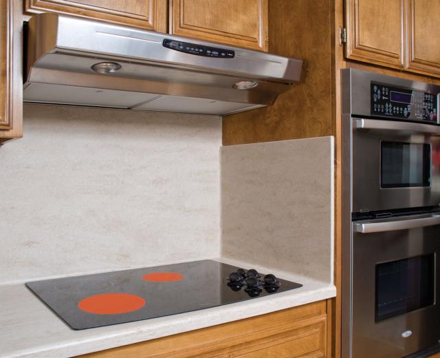 Sacramento resident Liz Lum assisted her 79-year-old mother with housing retrofits such as this safety stove, which glows red until it's cool enough to touch. 

(Photo: Mike Graffigna)