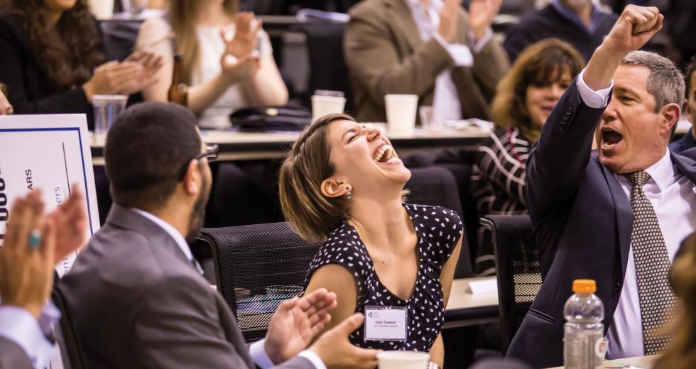 Kate Towson of Women's Empowerment reacts to winning the $10,000 Judges Award at SVP's Fast Pitch, an event that rewards nonprofits with a plan.