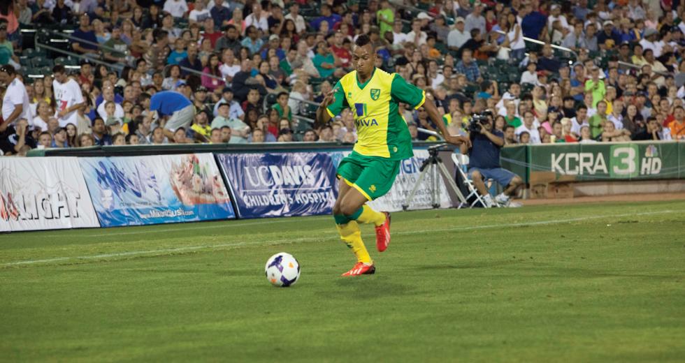 Nathan Redmon from Norwich City F.C. carries the ball during his team’s friendly match at Raley Field during Sacramento Soccer Day on July 18, 2013.