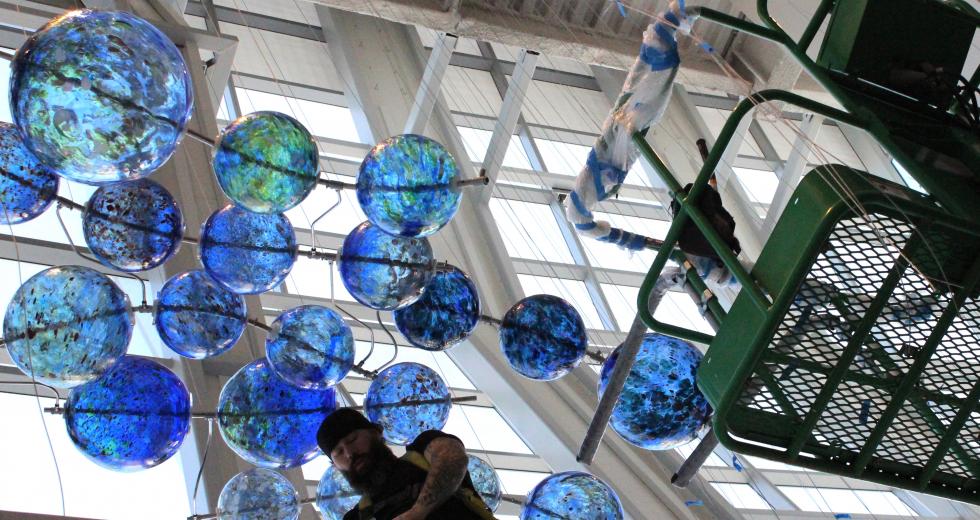Bryan Valenzuela’s half-completed sculpture, “Multitudes Converge,” is unveiled at the Golden 1 Center in Sacramento. (Photos by Sena Christian)