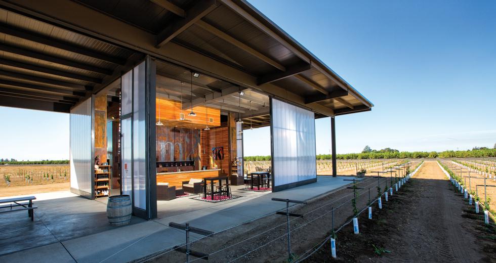 Designed by John Vierra, m2 Vintner’s new indoor/outdoor structure offers patrons the chance to relish the flavors of wine and views of the vineyard simultaneously. 