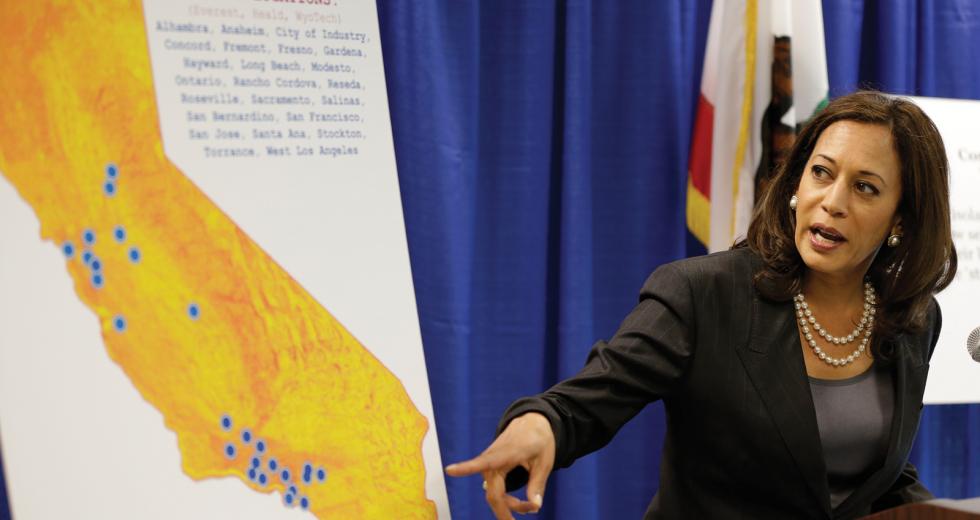 California Attorney General Kamala Harris points during a news conference to a display showing the location of Corinthian Colleges in California. 

(photo by © Eric Risberg/ /AP/Corbis)