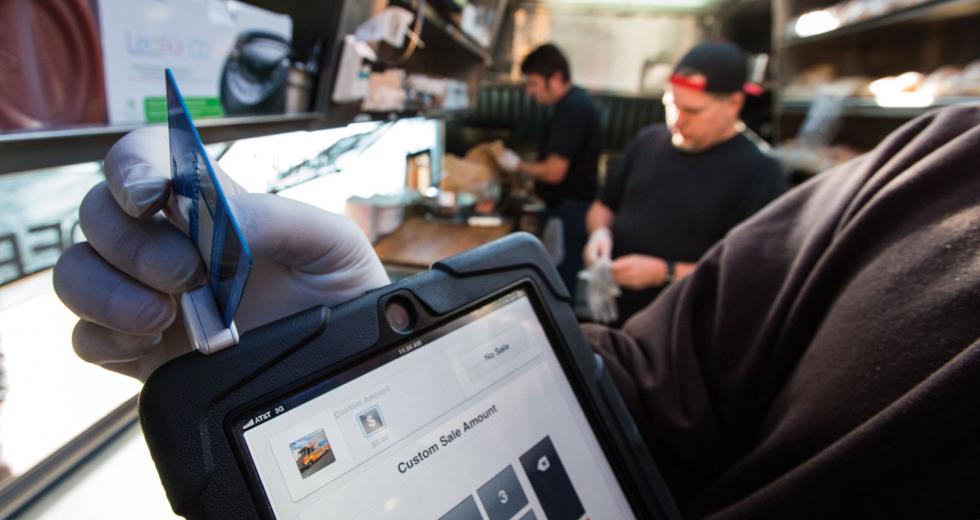 Drewski’s Hot Rod Kitchen uses Square, a mobile credit card reader, to process customer payments on location.