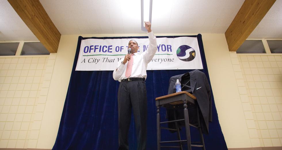 Kevin Johnson gets face time with constituents at a town hall meeting at George Sim Community Center.