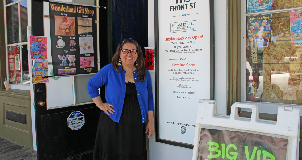 Wild Sisters Book Company owner Claire Bone stands outside The Paperworks Building in Old Sacramento. (Photo by Jacob Peterson)