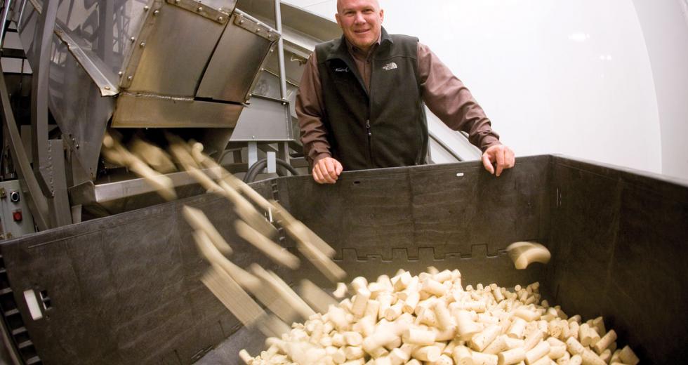 James Herwatt, CEO of Cork Supply USA, which typically sips about 15 million corks a month