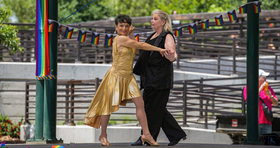 Two dancers from the Q Rated Dance Co perform at Placer Pride in Roseville's Royer Park, May 18, 2024. (Shutterstock photo by Chris Allan)