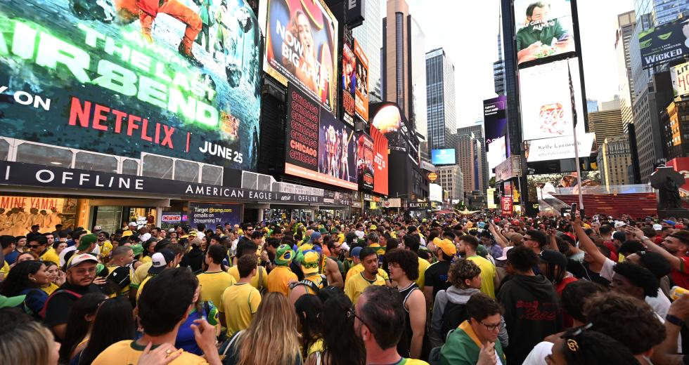 Fans of Brazil's soccer team celebrate in New York's Times Square June 12, 2026. (Shutterstock photo)