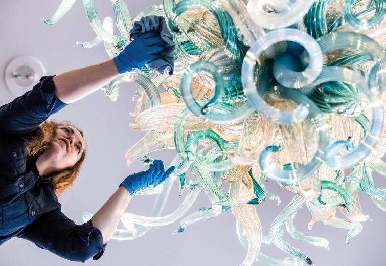 Svozil used an electrostatic duster — with electrically-charged fibers that attract dust — before transitioning to the rag and cleaning fluid. She works in silence for two hours on a Monday while the museum is closed. Svozil or her colleague, who both work as preparators, (they move, unpack, hang and clean art) do a light cleaning on this contemporary sculpture every two or three months, with a more thorough cleaning done annually.