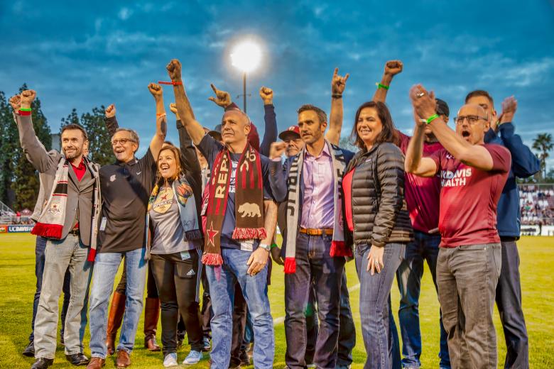 Sacramento Mayor Darrell Steinberg (middle) shows his support along with other team and city officials for the city’s bid as a Major League Soccer franchise before Saturday’s game.