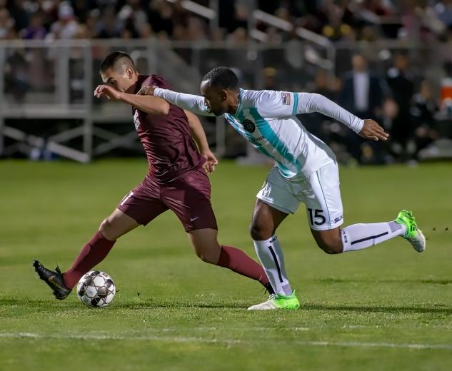 Sacramento native Cameron Iwasa, a 2011 Jesuit High School graduate and Republic FC’s all-time leading scorer, battles Austin Bold FC’s Amobi Okugo during second-half action at Papa Murphy’s Park.