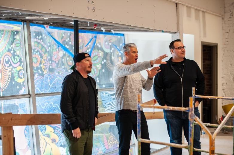 From left: Business partners Abe Cunningham and Sonny Mayugba with Director of Operations Justin Jabali inside Solomon’s Deli in Sacramento, which is expected to open this summer.