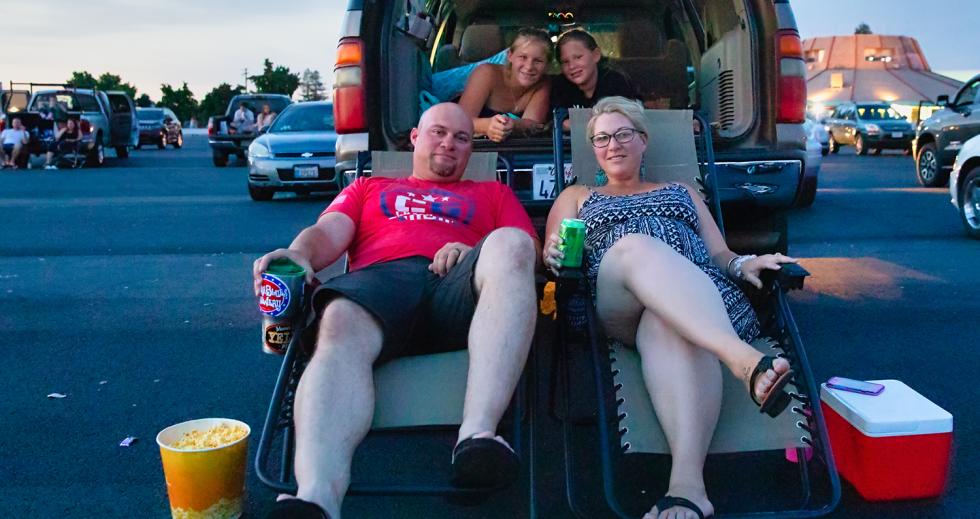 Sacramentans Nick Tamatini (lower left) and Emily, along with Chloe and Ellie, enjoy their first trip to the West Wind Drive-In.