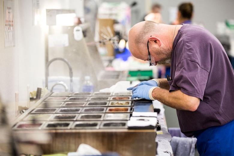 Matt Potulny, a finishing specialist at VSPOne Optical Technology Center-Sacramento, has been with the company 29 years, making him one of the longest-standing employees at the lab. Potulny’s job is to create fashion tints on prescription lenses by dipping them into colored dyes to match samples sent by in by the doctor’s office. Matt Potulny, a finishing specialist at VSPOne Optical Technology Center-Sacramento, has been with the company 29 years, making him one of the longest-standing employees at the lab. Potulny’s job is to create fashion tints on prescription lenses by dipping them into colored dyes to match samples sent by in by the doctor’s office.