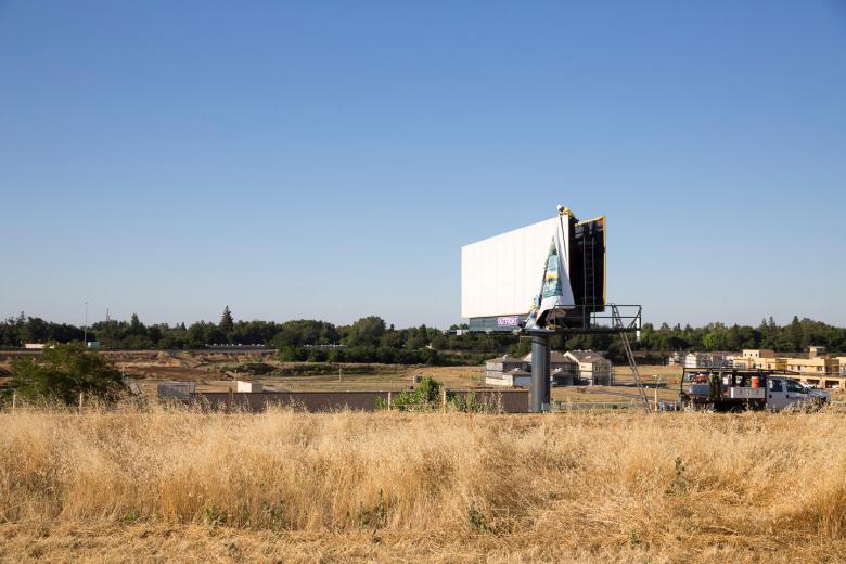 Normally, two people form a crew, but that’s flexible. “Sometimes, depending on if it is a larger vinyl … or in a high breeze with a little bit of wind, we will add one or two more people to the crew for that day or location,” explains Operations Manager Forrest Porter. It normally takes an hour or less for a crew to install the billboard, depending on its size and the day’s weather conditions. A crew will complete five to eight installations in a typical eight-hour day.
 Normally, two people form a crew, but that’s flexible. “Sometimes, depending on if it is a larger vinyl … or in a high breeze with a little bit of wind, we will add one or two more people to the crew for that day or location,” explains Operations Manager Forrest Porter. It normally takes an hour or less for a crew to install the billboard, depending on its size and the day’s weather conditions. A crew will complete five to eight installations in a typical eight-hour day.