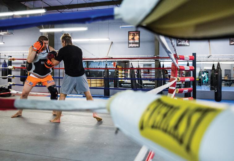 It’s Duane Ludwig’s job to get kicked by Urijah Faber. It’s his job to get kicked and punched by a lot of guys, actually. Ludwig (orange shorts), 34, is a Muay Thai kickboxer, mixed martial artist and the head coach for Sacramento’s Team Alpha Male, a squad of about 30 MMA fighters training out of Faber’s Ultimate Fitness gym. It’s Duane Ludwig’s job to get kicked by Urijah Faber. It’s his job to get kicked and punched by a lot of guys, actually. Ludwig (orange shorts), 34, is a Muay Thai kickboxer, mixed martial artist and the head coach for Sacramento’s Team Alpha Male, a squad of about 30 MMA fighters training out of Faber’s Ultimate Fitness gym.