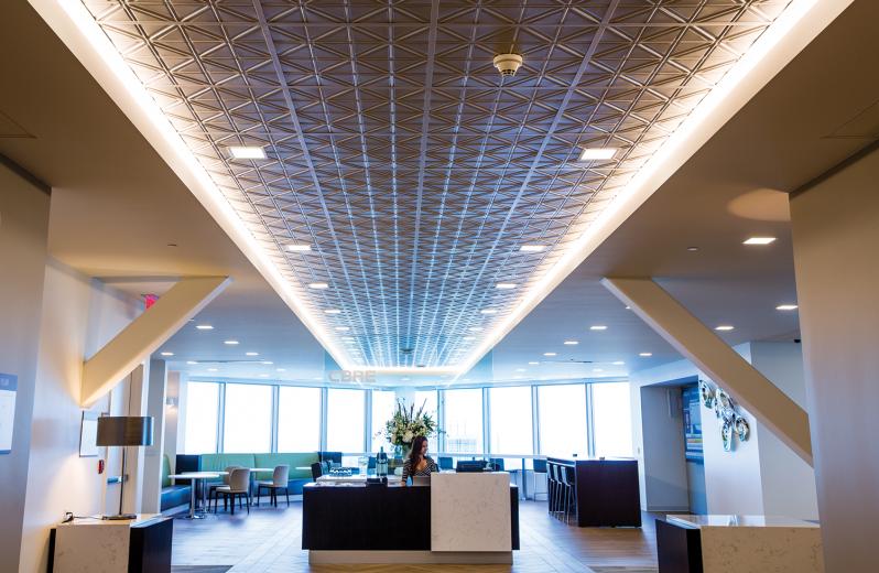 Flexible seating solutions at CBRE in downtown Sacramento allow employees to sit anywhere, work while standing or grab a window seat in the lobby lounge.