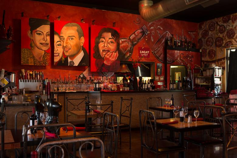 Todo un Poco co-owner Marie Mertz is an art lover and collector. All of the restaurant’s paintings are original works she commissioned. 