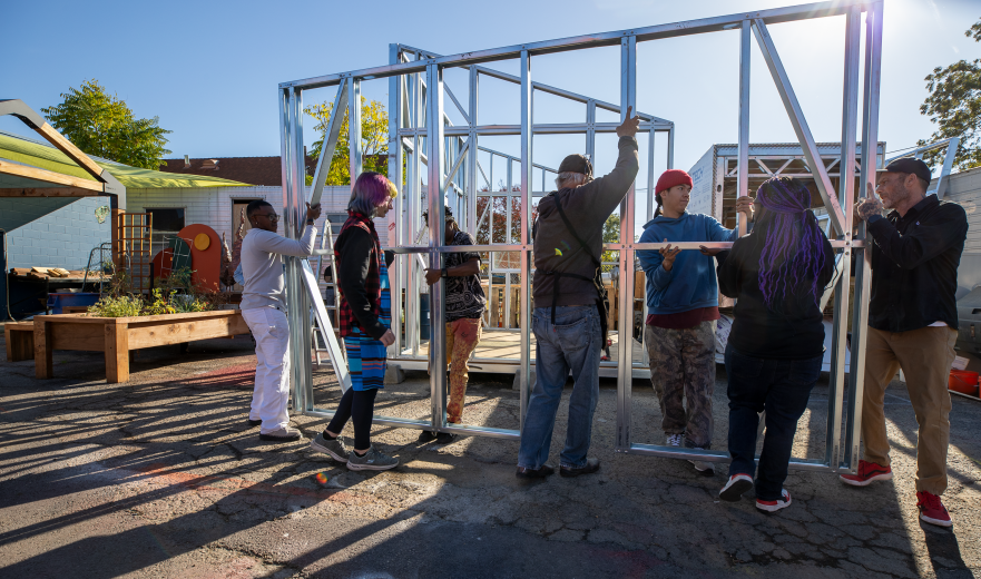 Chad Orcutt, right, building a tiny home with one of his classes in November 2023. (Photos by Steve Martarano)