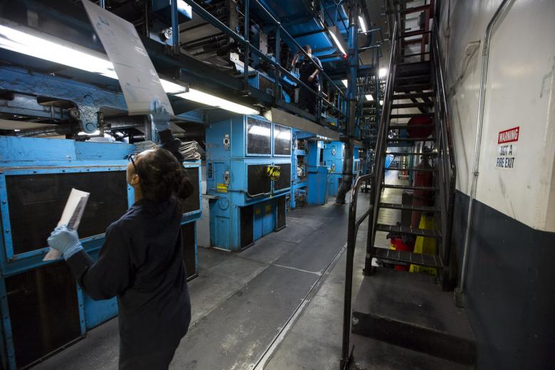 The Bee uses offset printing, a lithographic process in which an inked image is transferred from a plate to a rubber blanket to paper.