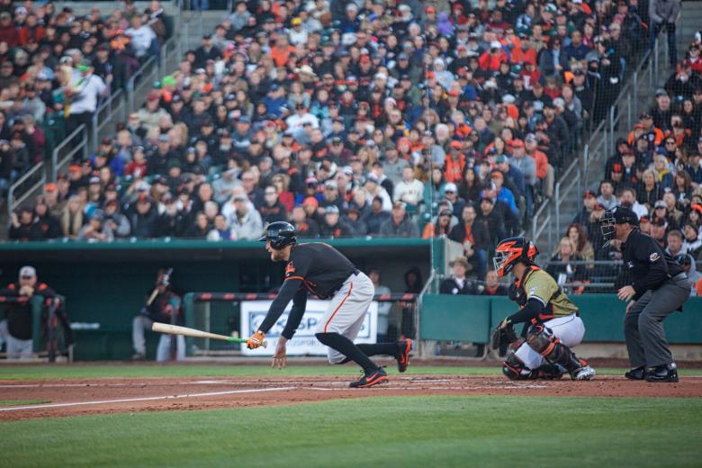 Hunter Pence singles to right field in the top of the fifth inning Saturday night at Raley Field.