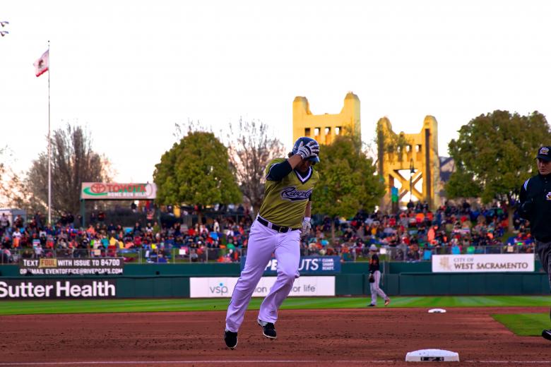 River Cats designated hitter Kyle Jensen rounds third and heads for home after his second-inning homer put Sacramento ahead 2-1.