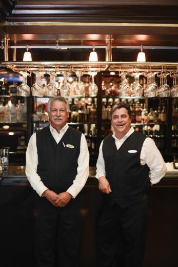 Augie Moran and Rob Lopez have been tending bar inside Dawson’s at the Sacramento Hyatt since its opening day in 1988.
