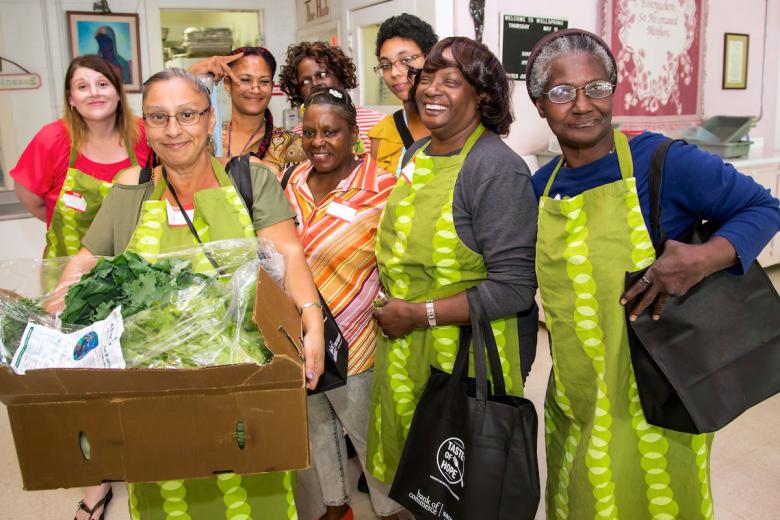 After the first session on May 14, Wellspring participants at the Co-Op Community Kitchen were all smiles. Leah Yadon (back row left) said the classes have helped her realize “I’m worth the time and energy to fix a healthy meal.” After the first session on May 14, Wellspring participants at the Co-Op Community Kitchen were all smiles. Leah Yadon (back row left) said the classes have helped her realize “I’m worth the time and energy to fix a healthy meal.”