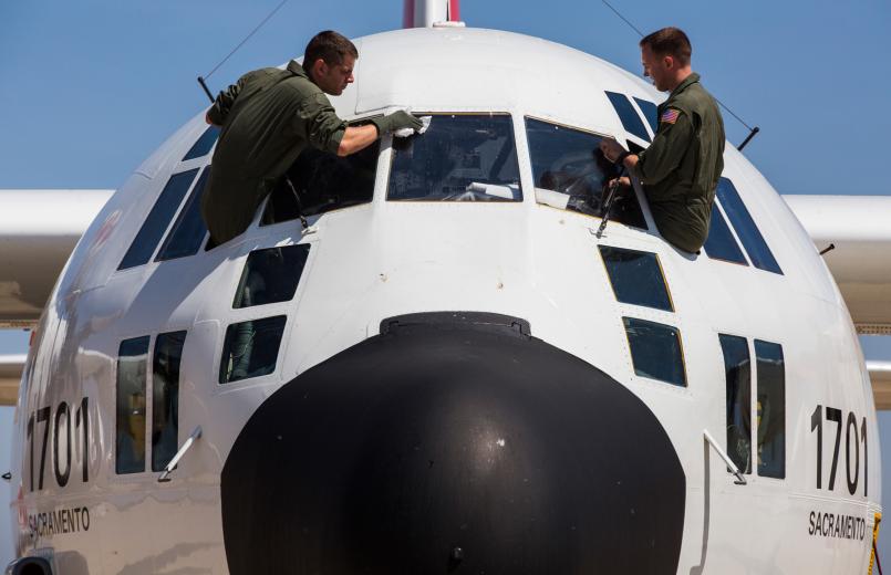 Avionics Electrical Technicians John Hagerty and Dan Boyd run routine maintenance on their aircraft before departure.  Avionics Electrical Technicians John Hagerty and Dan Boyd run routine maintenance on their aircraft before departure.