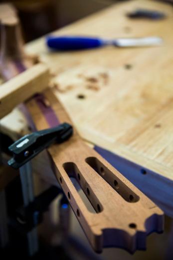 His construction skills came from woodworking courses he took in high school. Carpenter calls the completion of his first 5-string classical guitar a “happy accident.” His construction skills came from woodworking courses he took in high school. Carpenter calls the completion of his first 5-string classical guitar a “happy accident.”