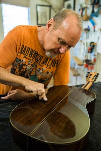 Carpenter is about to finish his 20th guitar. For now, he commissions about three per year, but eventually he would like to sell his custom printing shop, West Coast Decal on Roseville Road in Sacramento, to make guitars full time.
Carpenter is about to finish his 20th guitar. For now, he commissions about three per year, but eventually he would like to sell his custom printing shop, West Coast Decal on Roseville Road in Sacramento, to make guitars full time.