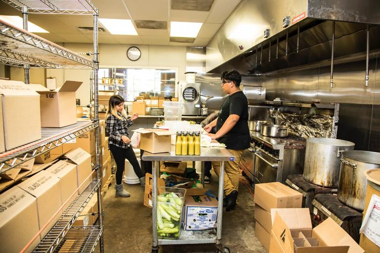 Rosie Espinosa and Leo Lopez prepare to wrap up their day in the kitchen at Preservation & Co.