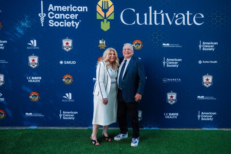 Cerie Echhorn and Phil Oats, Chairman of the Board, Buzz Oates