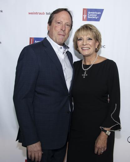 Chip Dusseau, real
estate agent, Coldwell Banker Realty; Diane Dusseau, president,
property & casualty practice leader, USI Insurance Services