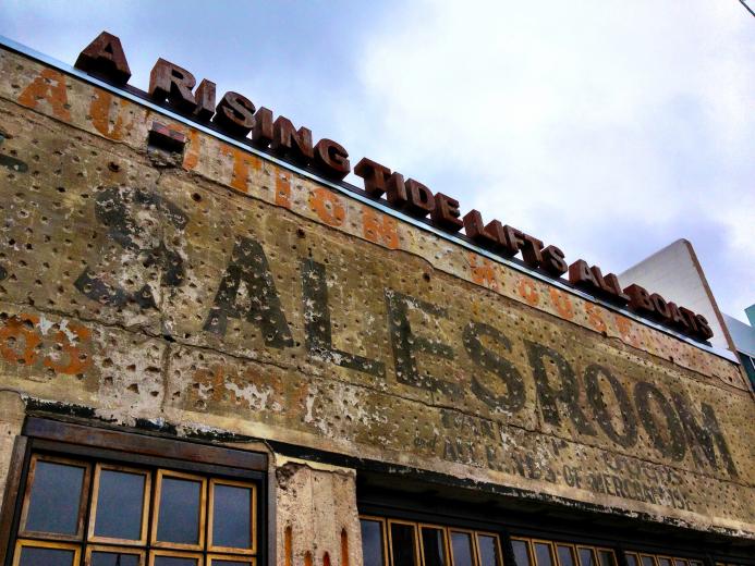 The Ironside Fish & Oyster Restaurant with its "living wall" and "A Rising Tide Lifts All Boats" sign on the roof line. The Ironside Fish & Oyster Restaurant with its "living wall" and "A Rising Tide Lifts All Boats" sign on the roof line.